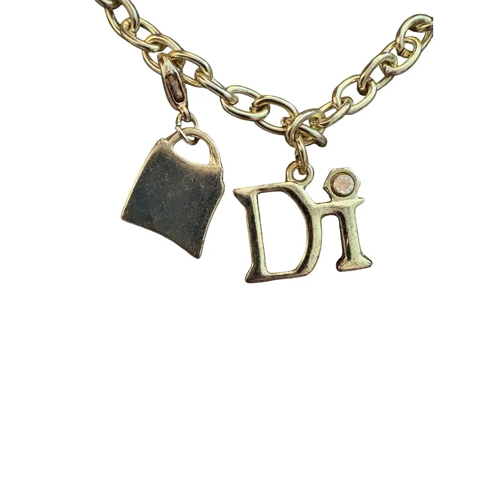 Diamonds International gold tone